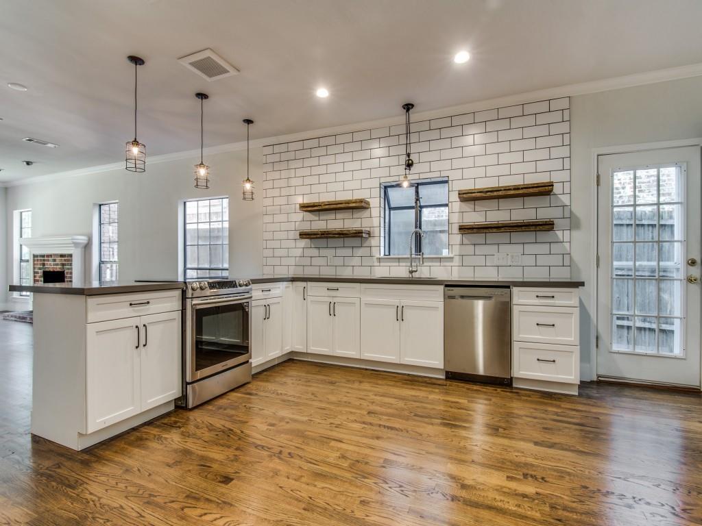 Industrial chic style in the heart of East Dallas. Recycled wood, open concept, and industrial accessories, complement the historic charm of this architectural lady. 3 bedrooms 2 baths 1726+230 sqft studio. Almost 2000sqft. of easy living. Totally remodeled including kitchen, laundry and main bath plumbing. Main Bedroom has two walking closets and a spa like bathroom. Separate laundry room with pantry closet, off the kitchen. Access to the backyard through the kitchen and the main bedroom.