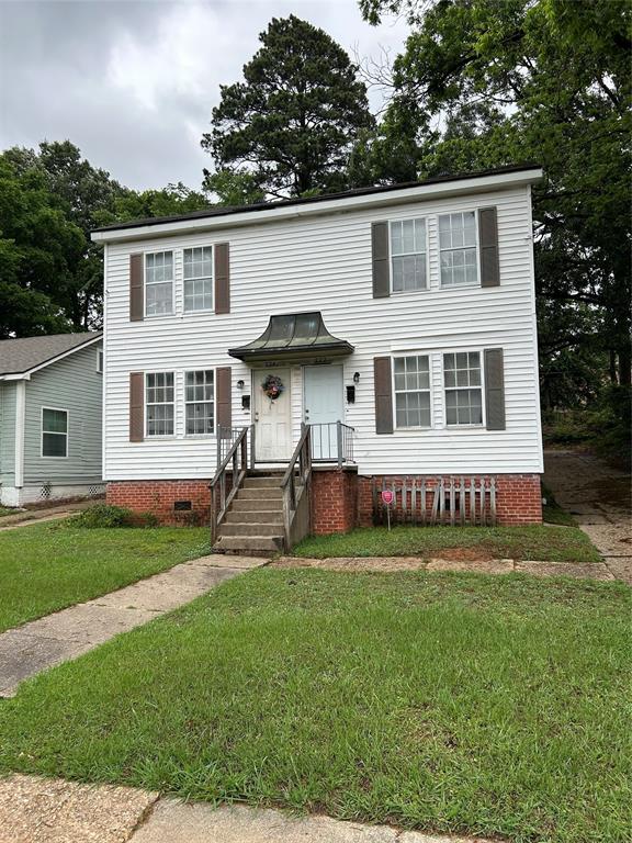 Low maintenance investment opportunity, upstairs and downstairs units. both units have a large kitchen and separate dining rooms and Washer and dryer hookups. Upstairs new paint and putting in new dishwasher. All appliances remain to include refrigerator.  Clean, Lots of light and ready to lease upstairs.  Close to public transportation and convenient to the VA hospital. The downstairs unit has a 10 year resident paying $615 per month on a month to month lease and can stay if wanted. Upstairs unit is vacant! Parking out back with parking pad.  Vinyl siding for low maintence!
