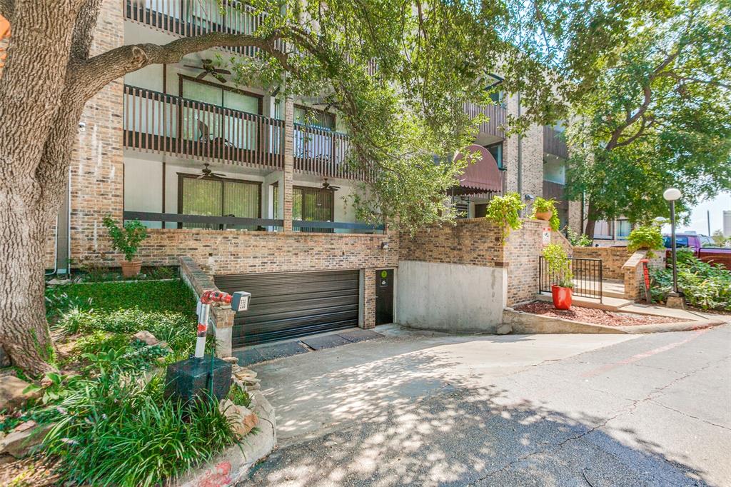 Don't miss this freshly painted 1 bed 1 bath condo. Priced to sell, under tax value! This will be a great home for a first time home buyer or investor. When you enter, you are greeted by light from the large balcony looking into the living area. Enjoy the access to  your own balcony from the living room or bedroom or a cozy fire in the winter from your living room fireplace. It is located near shopping, restaurants, Central Expressway, Presbyterian Hospital and more. This unit is in a small 26 unit complex with secure, assigned parking in the garage. Access to the building is secure. You can take the elevator from the parking garage up to the second floor condo and never be out in the weather.