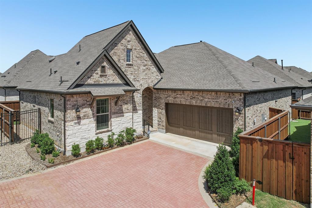 Experience elevated active adult living in this beautifully upgraded David Weekley home located in the sought after 55+ Elements at Viridian community. Thoughtfully designed with quality craftsmanship and builder upgrades throughout, this single story residence offers an open concept layout that seamlessly blends comfort and style.

The spacious living area is filled with natural light and flows effortlessly into the designer kitchen, creating the perfect space for everyday living and entertaining. The private primary suite provides a peaceful retreat, while the secondary bedroom offers flexibility for guests or hobbies. Step outside to a low maintenance backyard featuring professionally installed artificial turf, allowing you to enjoy outdoor living without the upkeep.

Residents of Elements at Viridian enjoy a resort inspired lifestyle with exclusive access to the Magnolia Lifestyle Center, complete with a fitness center, resort style pool, pickleball and bocce courts, arts and crafts studio, social events, and gathering spaces. You'll also enjoy access to Viridian's extensive amenities, including miles of walking and biking trails, scenic lakes, parks, green spaces, fishing, kayaking, and more—all conveniently located between Dallas and Fort Worth with easy access to DFW Airport, shopping, dining, and major highways.