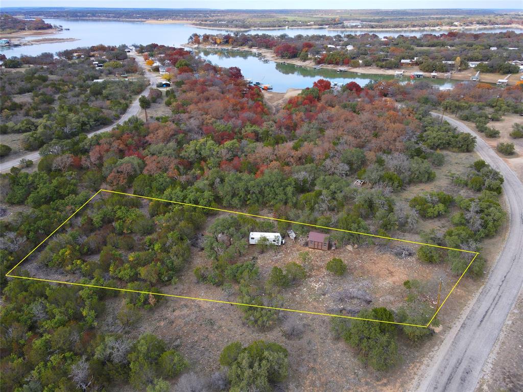 Single family 0.698 acre homesite for sale in the beautiful Lake Brownwood area with wet weather creek running along the back of the property and an abundance of wildlife.  Electricity is available at the road for easy installation, septic will need to be installed. Lake Brownwood public boat ramp and grocery store is just minutes away. Two of our fast growing communities Brownwood and Early are a quick 10 minute drive offering many museums, parks, medical centers and shopping!