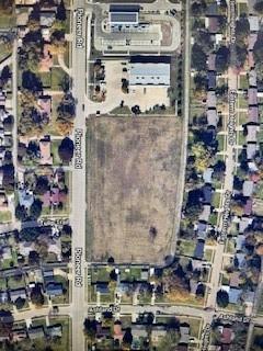 Over 3 acres of land on busy Pioneer Rd. This area is a densely populated residential area.  5 mile trade area has a population of over 198,000 residents. Cartwright and Pioneer road combined have over 31,000 cars per day pass through. Zoned Light commercial-retail.  Perfect for a strip mall, medical, dry cleaners, salon, automotive, or so many other things. Right next to a busy Dollar General and half a mile from another Dollar General to tell you how busy it is-they had to have a second. Down the street from CVS, Planet Fitness, a laundromat, several churches, gas station, and more. Tom Thumb nearby. Up to the buyer to find if any restrictions are placed by Dollar General. So many options for this incredible property! Buyer to verify what utilities on property.