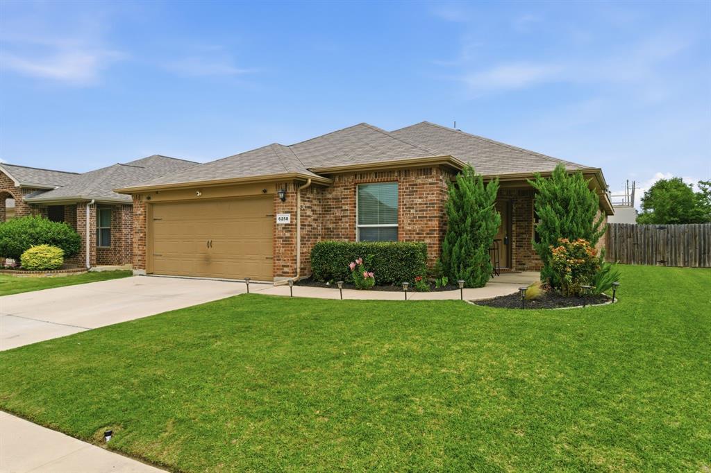 This versatile 4-bedroom home includes a flexible space ideal for a home office, hobby room, or guest room. Located in the highly sought-after Eagle Mt-Saginaw ISD and within walking distance to Boswell High School.

The covered front porch offers a welcoming entry. Inside, the open-concept layout provides excellent natural light throughout the living area, breakfast nook, and kitchen. The split-bedroom design enhances privacy and works well for a variety of living arrangements.

The kitchen features ample counter and cabinet space, a walk-in pantry, and a convenient bar-top for quick meals. The family room includes durable luxury vinyl plank flooring and is well-suited for gatherings. The primary suite is located at the back of the home and offers dual vanities and a spacious walk-in closet.

The property is minutes from shopping, dining, Eagle Mountain Lake, and the Fort Worth Nature Center, offering a balance of convenience and outdoor recreation. This home is move-in ready and prepared for its next owner. A new roof will be installed prior to closing, and the refrigerator, washer, and dryer may convey with a strong offer.