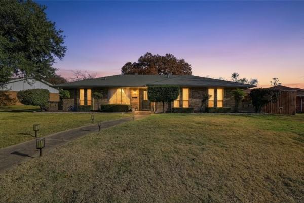 NEWLY REMODELED!! Nestled in one of Plano’s most loved neighborhoods in Dallas North Estates, this home brings charm, new upgrades, and big Texas vibes. This 3-bedroom, 3-bath gem brings major “wow” energy from the moment you drive up. The classic brick façade sets the tone right from the start, from the moment you walk inside it instantly shows off what makes this home warm and special.

The entry opens into a massive living space built for hosting, lounging, and everything in-between. With its high ceilings, architectural beams, LVP flooring throughout  and dramatic brick wall fireplace, this space nails that modern-meets-cozy aesthetic.

A second oversized living area gives you all the flexibility: game room, media room, playroom, whatever your life calls for. It flows straight to the newly fenced backyard, complete with a huge shade tree, storage shed, and a built-in pet door so your pups can live their best yard life.
The kitchen is fresh and modern, decked out with stainless steel appliances, new countertops, a new backsplash, and a custom coffee + wine bar that includes the mini wine fridge. Morning lattes and evening cabernets? You're covered.

The primary suite is basically a retreat. The extended layout features a walk-in closet, an inviting seating area, and a fully reimagined bathroom with double vanities and a walk-in rain shower that feels like a boutique hotel. Also, enjoy the newly added half powder bath your guests will low-key rave about.

This community is surrounded by some of the best lifestyle perks in Central Plano—Liberty Recreation Center offers pools, sport courts, fitness facilities, yoga, event space, pickleball, and so much more. You’re only blocks away from Top-tier Plano schools and quicker access to major expressways with convenience to DFW Metro-Plex and North Dallas.

If you’re craving space, style, and a location that hits all the marks, this home is the move. Come see it in person—you’ll feel instantly at home.