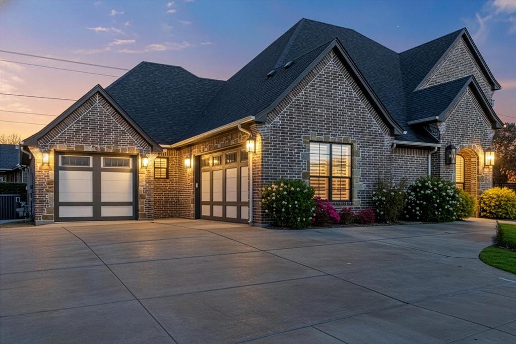 Gorgeous Private Home in highly desired Harbor Lakes gated community. Lots of updates and features you wont find on other homes. This home has a wonderful open concept living, dining, kitchen area that is large enough for entertaining, but still cozy enough to enjoy a peaceful evening at home. There's a fantastic screened in patio with ceiling fans to enjoy the outdoors. The patio is also fitted with a natural gas outlet if you want to add a BBQ or outdoor kitchen. Inside there is fantastic light wood flooring through out the home. Just inside one garage is a huge utility room with a sink, room for full sized Washer - Dryer, hanging clothes area, and still leaves room for an additional refrigerator or freezer. Coming is from the spacious 2 car garage, is a large mud room with storage above and below and a closet for coats. This leads to the butlers pantry and into the amazing kitchen with huge island and features Kitchen Aid appliances. Around the corner is a full bath right next to what could be an office or bedroom. Upstairs will take you to another full bath, 2 additional bedrooms and a storage - workout room. And finally the Primary suite is downstairs just off the dining room. Plenty of space for a King Size Bed, tables and some seating. The primary bath is also very impressive with a large 2 person shower, separate vanity ares, private toilet, and a huge closet with pull down clothes racks, full sized mirror and plenty of storage for shoes, clothes and a built in dresser. Please check out the virtual tours to see the layout and virtual staging. Lots of information is on the transaction desk that you should see before making an appointment. Call Grady Hancock at 817-343-6913 for questions or to set up a showing.