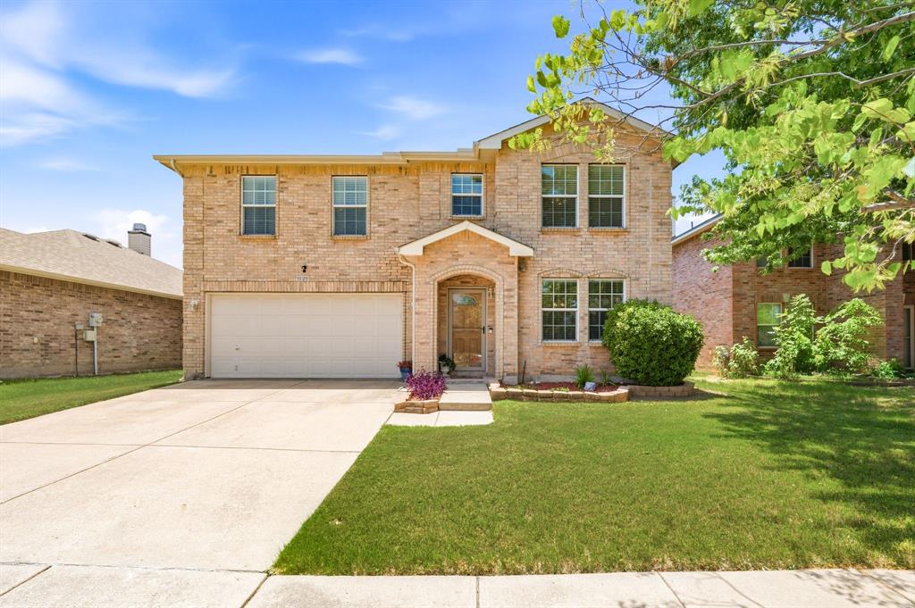 You've found the home you've been waiting for. Beautifully maintained and ideally located in highly sought-after Northwest ISD, this spacious home offers the perfect combination of comfort, convenience, and move-in-ready peace of mind. Just minutes from Texas Motor Speedway, the Alliance Corridor, shopping, dining, and major highways, you'll enjoy easy access to everything North Fort Worth has to offer.
Say goodbye to cramped bedrooms. This thoughtfully designed floor plan features generously sized bedrooms, three spacious living areas, and plenty of room for everyone to spread out. The oversized primary suite easily accommodates large furniture while still leaving space for a sitting area or reading nook. The ensuite bath features dual vanities, a relaxing garden tub, and an expansive walk-in closet, making busy mornings a breeze.
Designed with both entertaining and everyday living in mind, all bedrooms are located upstairs, allowing guests to gather comfortably in the open-concept kitchen and living spaces without sacrificing privacy. If quiet mornings are more your style, you'll appreciate enjoying a cup of coffee on the shaded back patio overlooking the well maintained landscaping.
Simply bring your furniture, this home is truly move-in ready. Major systems have been well cared for, including an HVAC system that is less than one year old, giving you added confidence in Texas heat for years to come.
As an added bonus, you're just a short walk from one of Harriet Creek Ranch's neighborhood amenities, including a community pool, sports court, and playground perfect for enjoying the neighborhood lifestyle.
Schedule your private showing today and come experience everything this exceptional home has to offer.