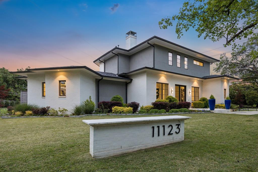 Built in 2018 and thoughtfully designed for both luxury and sustainability, this exceptional home seamlessly blends high-end finishes with cutting-edge efficiency. Marvin doors and windows, owned solar panels backed by three Tesla powerwall batteries, spray foam insulation, Nest smart controls, and a 50-year roof ensure lasting comfort and long-term value. A grand entrance sets the tone — lush professional landscaping and two striking art walls frame the approach, while double front doors open to an expansive living area bathed in natural light. Walls of glass sliding doors dissolve the boundary between indoors and out, revealing the resort-style backyard beyond. The gourmet kitchen is a chef's dream, appointed with a Bertazzoni cooktop and convection microwave, Sub-Zero refrigerator, double ovens, and a wine refrigerator with 150+ bottle capacity. The showpiece island is crowned with rare marble sourced from Bogotá, Colombia — a one-of-a-kind detail that anchors the entire space. This home offers four ensuite bedrooms, a dedicated study, an upstairs living area, and rich hardwood floors throughout. The owner's suite features a private sitting area and direct access to the backyard. Additional highlights include a three-car garage and elevator-ready closets — a rare and practical luxury. Outside, the private oasis delivers: a covered patio, pool with water feature, gas fire pit, turf lawn, and an eight-foot privacy fence. Ideally situated with easy access to Northaven Trail and premier private schools.