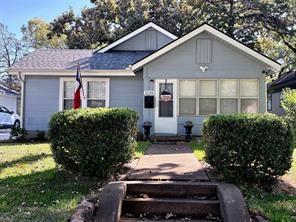 Nestled in a quite neighborhood this 2 bedroom 1 bath home offers warmth, charm and modern conveniences.  2 miles of The Bishop Arts Districts restaurants, shopping and bars and walking distance to the Dart Rail system.   Upgrades includes Electrical  2024, Plumbing 2020-2025, HVAC air conditioner 2019 gas furnace 2021, Hail Resistant Class 3 Roof (with warranty's) 2025. Enclosed Sunroom  for comfort all year round.  The  Living room has a brick fireplace with a gas hookup. Fully Remodeled Kitchen w eating area, breakfast bar, granite countertops, soft white close cabinets, 2 pantry's, gas stove.  Tankless Water Heater 2020. Remodeled Bathroom w free standing oval tub w shower.  LVP  luxury plank flooring ash colored throughout the interior. The house has decorative lighting, Primary bedroom has original cabinets, makeup vanity,  Hallway and secondary bedroom have bookcases that showcase the homes vintage appeal.  Large Dining room, wide windows throughout home. Front living room windows and all kitchen windows replaced 2020..  Ceiling fans in all major rooms.  Large fenced backyard with access to driveable Alley, Paved Driveway,  backyard also  has a 10x7 sun cast modernist sliding door storage shed made of heavy metal enforced plastic from Costco, stone patio. So much room for all your yard gear and outdoor fun.  2025 St. Augustine grass in front yard.   Its just waiting for you.