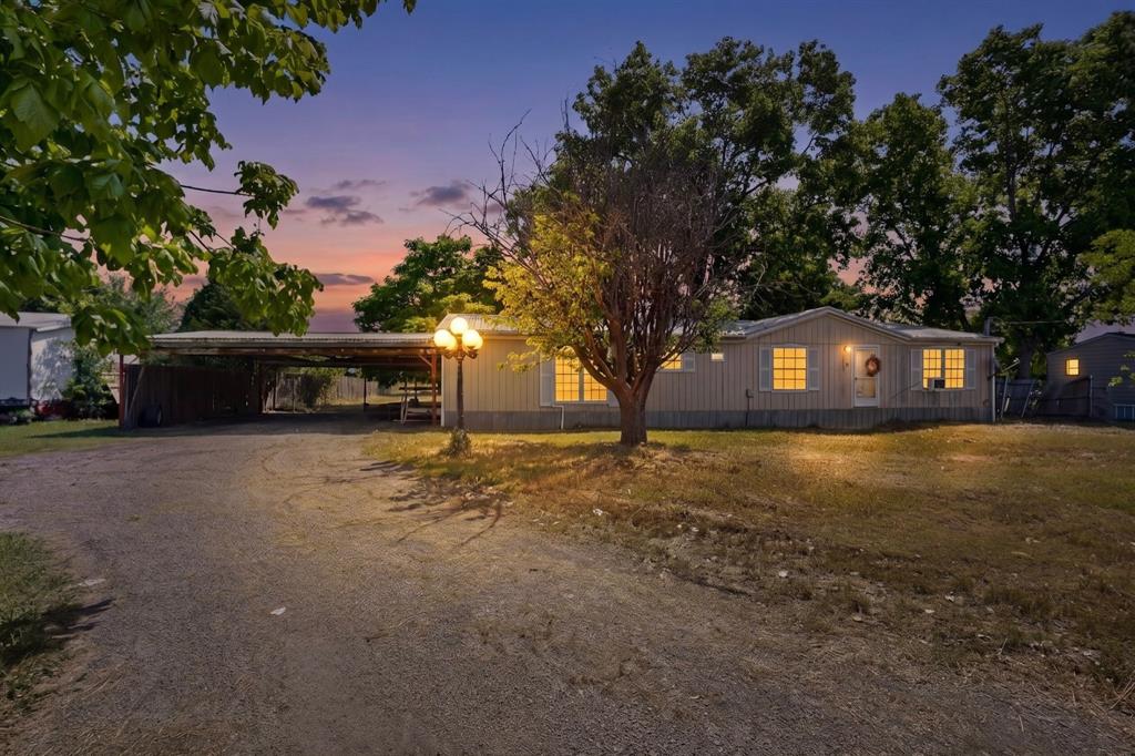 Charming 3-bedroom, 2-bath mobile home situated on a full 1-acre lot in Red Oak, TX with no HOA. this property features a spacious living area, functional kitchen layout, and plenty of outdoor space for parking, equipment, animals, or future improvements. Enjoy the privacy and flexibility of country-style living while still being conveniently located near shopping, dining, and major highways. Great opportunity for homeowners, investors, or anyone looking for affordable acreage in a growing area.