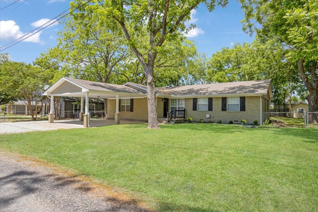 THIS PROPERTY IS ALSO LISTED FOR LEASE 1770 Sq Ft home set on one-third acre wooded yard that is stunning. The house is located in the heart of Van Alstyne. Walking distance to downtown.This darling home is ready for new owners. Almost everything has been replaced, rebuilt, and remodeled. 

3 bedrooms, 2 bathrooms, and 1 bonus area that could be used as a large dining table or an office. Huge family room converted from a garage. 
Large kitchen, completely renovated. 

All of the flooring, the entire kitchen, and the bathrooms have been renovated. The entire house has been painted, including the ceilings. HVAC and Water heater have been replaced within the past 5 years.
The sewer lines were replaced in 2023 with PVC.

Located in the sought-after VAISD. Enjoy the thriving town of Van Alstyne with lots of restaurants, shops and the central social district.