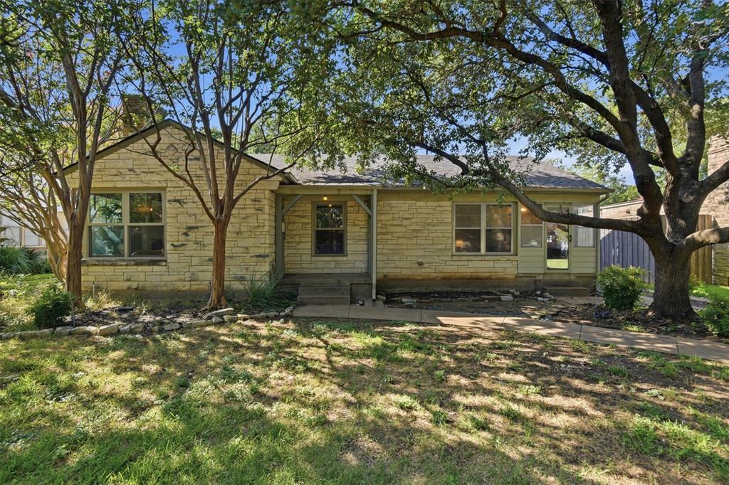 This incredibly charming Austin Stone bungalow is nestled in the highly coveted neighborhood of Stevens Park Village! Known for its unique vibe and scenic pocket parks, this community offers the perfect balance of neighborhood charm and urban convenience—enjoy a seamless daily commute with easy access to Downtown Dallas and I-30.Brimming with character and modern comforts, this adorable home features a classically updated kitchen and bathroom alongside gorgeously refinished hardwoods (2021). The layout offers incredible flexibility: an enclosed side porch stands ready for an easy conversion into a private primary ensuite bath. Step out to the massive, 18’ x 16’ screened back porch—the ultimate oasis for morning coffee, evening relaxation, and peaceful bird watching.Enjoy total peace of mind with extensive capital improvements, including a new water heater (2025), modern gutters (2025), updated HVAC (2022), and a 30-year roof (2019). Located in a vibrant pocket soon to be designated as its own Conservation District, this timeless gem balances historic preservation with future equity. Studies show Conservation Districts historically trigger a marked increase in property value and long-term desirability. Professional photography is coming soon—schedule your tour today!