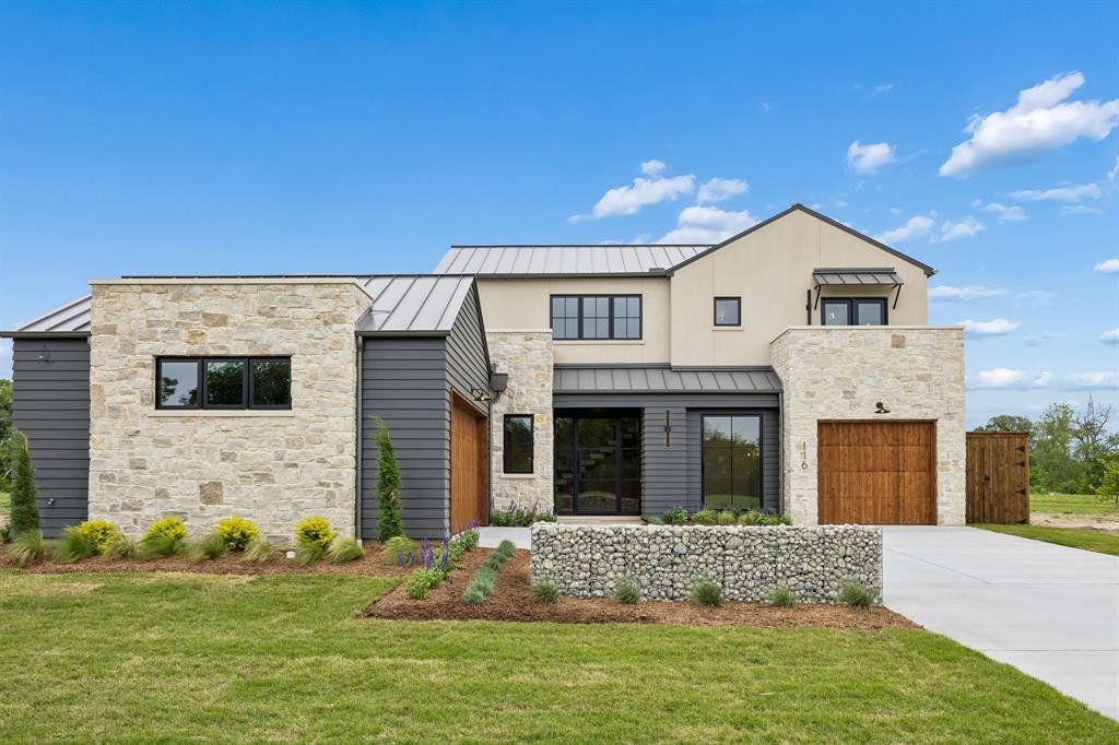 Enjoy this new 3,103 SF, 5-bedroom, 2-story home built by Holmes Builders. 1-story living with Master, Guest, Great Room, Kitchen, Laundry, and Office downstairs. Great Room, Kitchen, and Veranda layout is the ideal circulation space for entertaining large parties and makes simple relaxing a joy. 2 additional bedrooms upstairs with a Game Loft, all ensuite bedrooms. Exterior finishes with stone, stucco, and siding to create this transitional farmhouse. Metal roof with a balcony overlooking the front of the home. Huge picture windows! Oversized 2-1 garage split for room to park 3 cars. Spacious Master Suite, private Office space, linear slot air vents, custom cabinet, suspended staircase, pocket doors, foam encapsulation, high performance HVAC, Wolf & SubZero appliances, and more luxury finishes throughout this home. 
Backs up to a green space, no neighbor adjacent to rear property line.
Blackberry Farm is the only gated neighborhood in Coppell zoned for Coppell ISD. 
Currently under construction. Home completion is expected in March.
