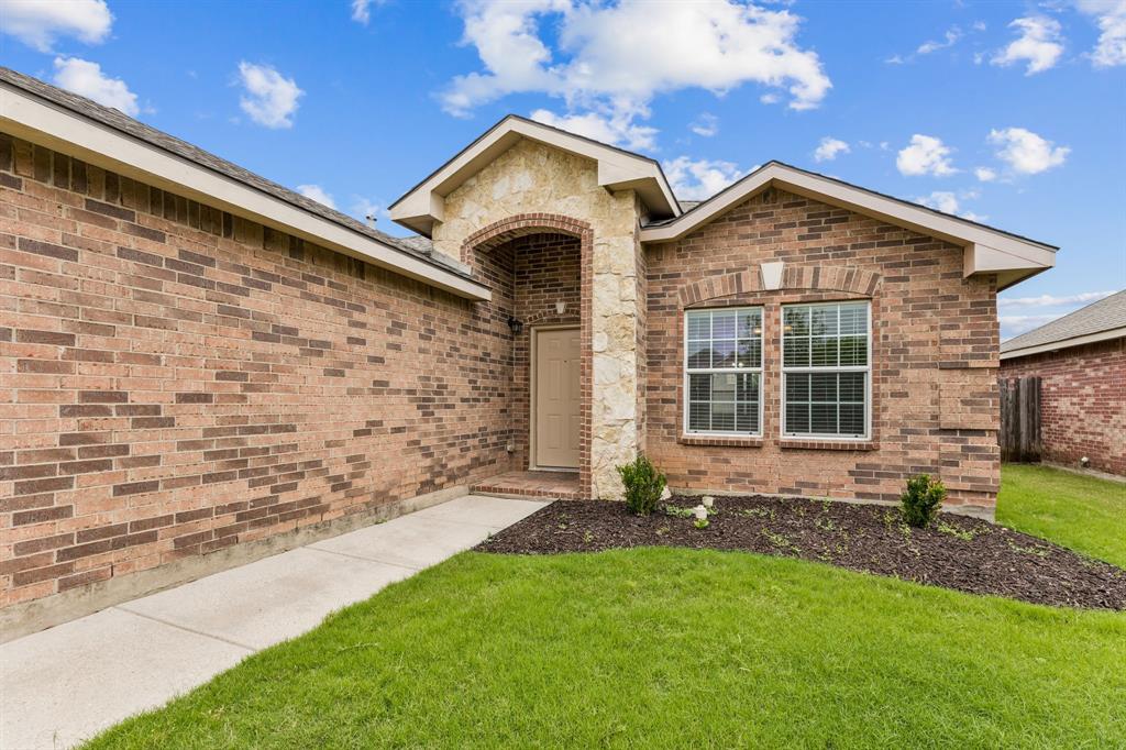 Location is the is advantage to this home. Conveniently located near Shops at Presidio Village with shopping and entertainment, Alliance Town Center for more shopping, HEB and Kroger, and easy access to I35W. This move-in-ready home welcomes its new owner with fresh paint throughout and newly replaced carpet in all bedrooms. The wood-look laminate flooring extends throughout the living room, hall, and dining area, creating a warm, cohesive, and inviting atmosphere. The entryway flows into a dedicated dining area, while the large living area at the back offers easy access to the backyard and a relaxing open patio. You will find a peach tree in the back yard and a pear tree in the front yard. The kitchen, centrally located between the main living and dining spaces, is equipped with an electric range-oven, a built-in microwave, a dishwasher, and a pantry. Two comfortably sized guest bedrooms share a full guest bath located directly across the hall. Tucked away for privacy at the rear of the home, the spacious primary suite boasts an attached private bath and a generous walk-in closet. A dedicated laundry room accommodates a full-size washer and dryer.