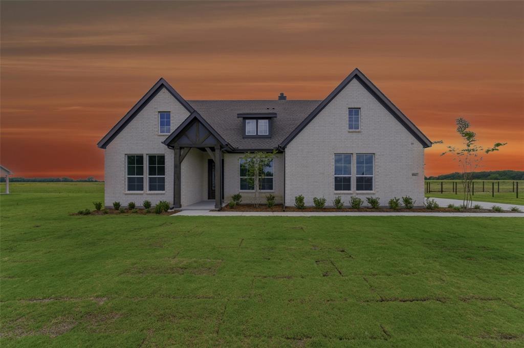 Ask us about our Trade In Trade Up program, we can buy your home! Upon entering the home off the front porch, you’re welcomed by an inviting foyer. Immediately to the left is a hallway with a bedroom, walk-in closet and full bathroom, as well as a linen closet. Past the foyer is the family entry, with storage space and mud bench, which leads to the laundry room and two or three car attached garage. Through the entrance, the home opens up to a large family room with a stately fireplace. Adjacent to the family room is a gourmet kitchen, equipped with a walk-in pantry, ample counter space and an oversized island. Finishing off this open-concept living area is a dining space which overlooks the covered back patio. A hall leads to two bedrooms with walk-in closets, another linen closet and a shared full bathroom. The back corner of the home offers privacy for the owner’s suite, featuring a massive walk-in closet and bathroom with a dual-sink vanity, standalone soaking tub and glass-enclosed shower.