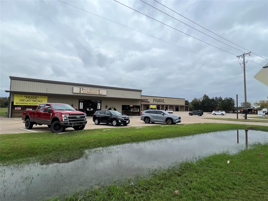 Don't miss out on this exceptional property. Whether you're ready to establish your business in a prime location or an investor with an eye for untapped potential, 1930 N Trade Days Blvd is the opportunity you are looking for. Situated in close proximity to I-20 in the heart of Van Zandt County, less than one hour from DFW, 1930 N Trade Days Blvd boasts excellent visibility, 6.8 acres of land, concrete parking lot, accessibility, and a strong local presence. The property is conveniently located near major thoroughfares, the World’s Largest Flea Market, shopping centers, popular local restaurants, and the Van Zandt Country Club. With 90,000 square feet of flexible space within 2 buildings connected by a covered breezeway, this property offers a blank canvas for customization and enhancement. This property has 7 total restrooms, elevator, multiple overhead doors, has a storage mezzanine with a loading door and staircase.