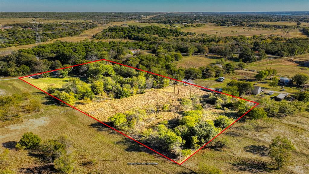 Tucked away in the quiet countryside of Weatherford sits just over 5 acres of open Texas land ready for its next chapter. This is a property where you can breathe deeper, enjoy wide Texas skies, and step into a setup that’s already prepared for immediate use.

With a water well, septic system, and electricity already in place, along with a covered RV hookup and washer dryer connections, you can pull in and start enjoying the property right away while planning your future home or barndominium.

The land is mostly cleared with scattered trees, offering a great balance of usable space and natural character. The surrounding area reflects a mix of rural residential properties typical for Parker County, giving you flexibility and freedom without HOA restrictions.

Whether you’re looking for a homestead, a weekend escape, or a build-ready property with utilities already installed, this land offers a strong foundation to make it your own. There is ample room to add fencing, landscaping, or privacy features to create the setting that fits your vision.

Located within Weatherford ISD and just a short drive to town conveniences, you’ll enjoy country living with easy access to everyday essentials.

Bring your RV, your plans, and your vision; this property is ready to support it.