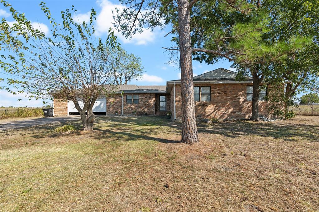 DON'T Miss out on this 6 acres with NO RESTRICTIONS,  Road frontage 400 ft and 650 ft Deep.  This beautiful expansive land offers endless possibilities for your country living, recreational activities. Enjoy the serenity of nature while being conveniently located near local amenities. With ample space for gardens, barns or even livestock. Home has 3 beds 2 bath and 2 car garage.  Home being SOLD AS IS. Seller will make NO repairs.  Home is clean and in working order just needs updating.  Agent to verify all measurements.