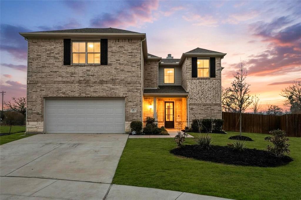 Discover modern luxury in this stunning 4-bedroom, 3-bathroom home in the sought-after Rosewood Estates neighborhood. Featuring an open-concept layout, this residence boasts high-end finishes, a chef-inspired kitchen, and two spacious living areas. The heart-of-the-home is the spacious family room, featuring dramatic 14 ft. ceilings and a cozy wood-burning fireplace that flows seamlessly into a gourmet island kitchen. Ideal for entertaining, the kitchen boasts stainless steel appliances, an electric cooktop, and an abundance of custom soft-close cabinetry and a large pantry perfect for all your storage needs. Escape to the opulent primary suite, featuring a spa-inspired bath designed for relaxation with a freestanding contemporary tub, dual sinks, separate vanity, and a large walk-in closet. Enjoy the ultimate in flexibility with a downstairs guest bedroom, featuring a nearby full bath, perfectly separated from the secondary bedrooms upstairs. Covered patio for shaded, year-round relaxation. Ideal outdoor living space perfect for entertaining, quiet mornings or pets. Conveniently designed layout with separate MUD room and laundry room to handle the day’s clothes before they ever enter the living space. Additionally, this home features a built-in pest control system, gutters and other thoughtful items to make more time for enjoying your home than worrying about it.