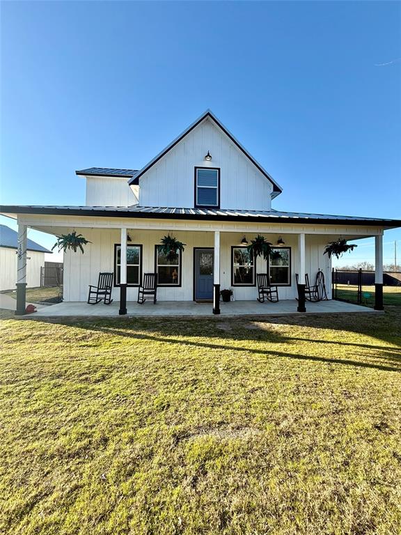Discover this stunning Modern Industrial Farmhouse with beautiful lake views, just 5 minutes from downtown and I-30. This open-concept home features a spacious living room and kitchen, perfect for entertaining. With 3 bedrooms and 2.5 baths, you’ll love the large walk-in pantry, concrete countertops, and oversized kitchen island. The primary suite is conveniently located downstairs and includes a gorgeous bath with black-and-white scroll tile, a walk-in shower, double vanity, and charming barn-style doors for the closet and bathroom. Upstairs offers a split-bedroom layout, plus a second den or game room and an additional craft space or office nook. Enjoy outdoor living with a large covered front porch and a covered back porch with private access from the primary bedroom. The expansive yard includes a board-on-board privacy fence and plenty of room for a garden or future pool.

A rare bonus: a 2,500 sq ft metal shop featuring 3 bay doors, an office, and a bathroom—fully insulated with heat and air.

This hard-to-find property offers an “out-of-town” feel while still inside the city limits. Conveniently located near the hospital, schools, airport, shopping, and restaurants, all on a beautiful 1-acre lot within walking distance of the lake.