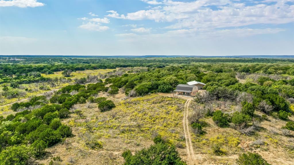 Welcome to a Scenic Valley! This phenomenal property offers prime hunting and recreational opportunities, featuring a hunter’s cabin and a spacious insulated workshop. Ideal for outdoor enthusiasts, the land boasts abundant wildlife, making it perfect for deer, turkey, and hog hunting. With a mix of wooded areas, open fields, and several stock tanks for fishing, it’s a haven for both hunters and anglers. Whether you’re hiking, ATV riding, or simply enjoying the serenity of nature, this property provides endless recreational options. Conveniently located with easy access to Mineral Wells–35 mins, Breckenridge–15 mins, Ranger–20 mins, PK Lake–15 mins, this is the ultimate retreat for those seeking privacy, adventure, and a perfect escape from the city.