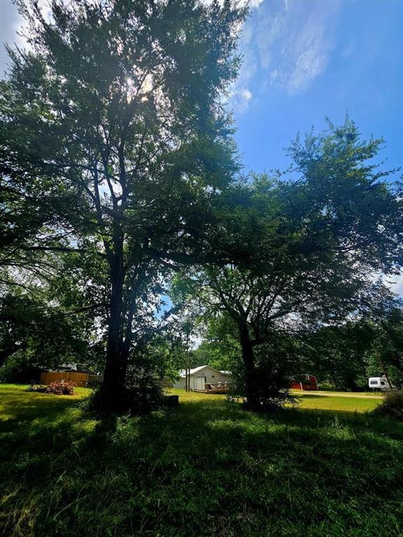 Nice, level lot nestled in a quiet, park-like setting, perfect for building your dream home near the lake. Located in a desirable waterfront community, this property offers the ideal balance of privacy and convenience, just minutes from shopping, dining, and medical facilities. Neighborhood amenities include a beautiful lakeside POA park featuring stunning views, pavilion, boat launch, and fishing pier. Situated outside city limits with deed restrictions requiring a minimum 600sf, site-built residence. This lot provides a wonderful opportunity to come and enjoy the fun, relaxing lifestyle on Cedar Creek Lake!
