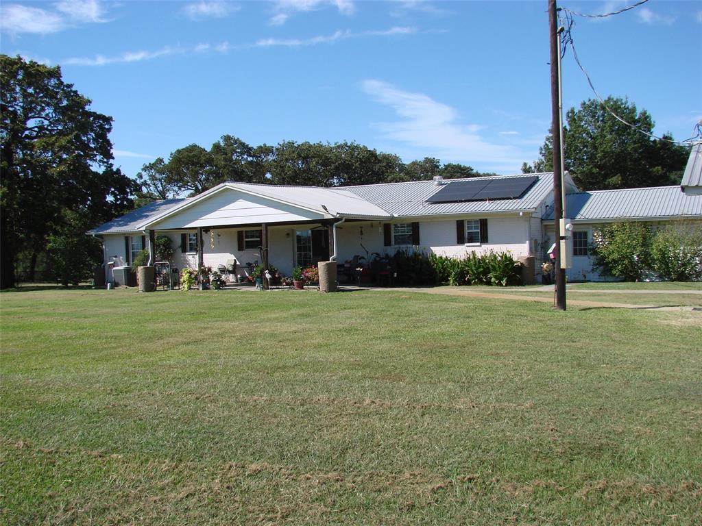 On 37 acres of pasture, with two ponds and mature trees surrounding the property, this Gordonville home has a welcoming feeling from the moment you arrive. The 1,677-square-foot house offers four bedrooms, two full bathrooms, and a front porch perfect for morning coffee. Step out back to the patio and take in the peaceful pasture views. 

Parking and projects are no problem here. There’s an attached two-car garage, a detached carport for three more vehicles, a barn, and a shop with electricity. Need a quiet spot to focus or work? There’s a separate office building ready for your plans.

With Whitesboro ISD and plenty of country charm, this home is more than just a house—it’s a space to live, play, and make your own.