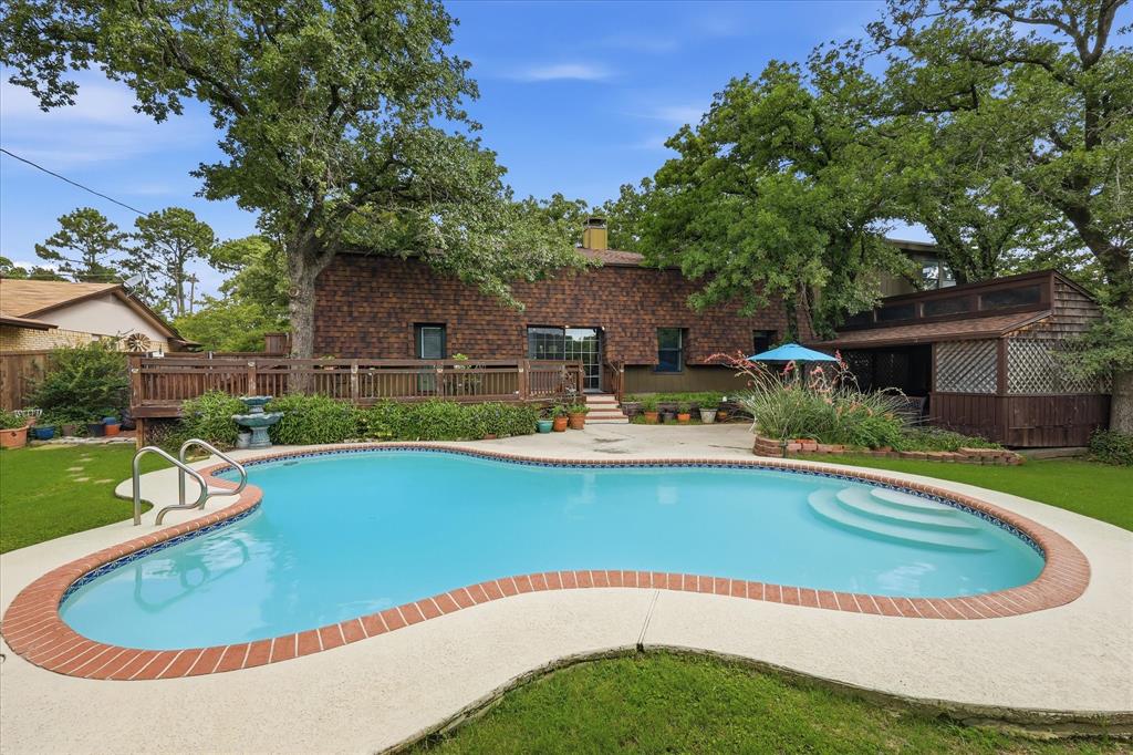 This property was purposefully designed as a near-lake residence, and it shows in every detail. An 8-minute walk puts you at the water's edge, yet the home offers every convenience to bring the lake lifestyle right to your own driveway, including a dedicated RV and boat storage drive — a rare feature that almost no homes in the area can match. Whether you're pulling in from a weekend on the water or heading out for an early morning launch, this home was built with that life in mind.
This home is also one of the very few residences in the Highland Village area to feature a Mansard roof — a distinctive French-inspired design with a double-slope profile that is as functional as it is beautiful. The steep lower slopes help regulate indoor temperatures year-round, keeping the home cooler in summer and warmer in winter, which translates into real savings on utility bills. The design also provides superior water drainage and a timeless curb appeal that simply cannot be replicated by today's standard construction. In a neighborhood full of homes that look alike, this one makes a lasting first impression.
Perhaps the most compelling feature of this property is the absence of an HOA, giving you the freedom to enjoy your home, boat, and RV without restrictions or fees. And yet, Highland Village is one of the most amenity-rich cities in North Texas, providing an extraordinary range of outdoor and recreational offerings right at your doorstep — at no additional cost. Within easy reach are Copperas Branch Park and Pilot Knoll Park along Lake Lewisville, the YMCA Camp on the lake, Wichita Forest trails, public boat launches, Unity Park (Kids Kastle), and city tennis courts. Highland Village consistently ranks among D Magazine's top DFW suburbs — and this home puts you at the center of everything that makes it special. Here, the lake isn't just nearby — it's part of your daily life.
Buyer is to verify all measurements, taxes, and information provided.