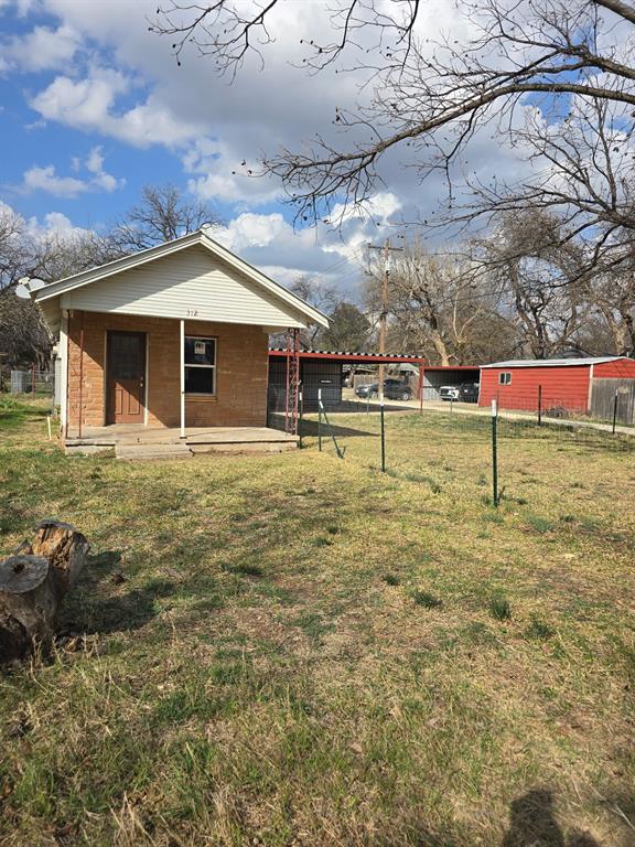 Great potential for someone to finish this property out! All brand new windows, all new plumbing and electrical run. LVP flooring through out. Kitchen has electric range and dishwasher, awesome kitchen sink and faucet. Just need  to finish out walls and add some finishing touches!  Spacious 2 car carport. Fenced side yard. Would make a great home or rental property when finished!