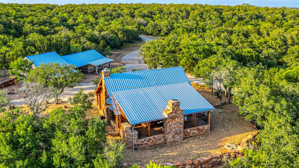 The Circle Smith Ranch is the ultimate Gentlemans Game Ranch 1 hour west of Fort Worth, TX in the scenic rolling hills of historic Thurber, TX. You'll find the ranch to be a turnkey operation ready for your luxury outdoor lifestyle. The main custom-built home is constructed with lodge poll shipped from Steamboat Co. Custom detail and opulence were put into the homes and ranch from start to finish. The guest quarters, game room and covered parking are constructed with timber shipped from Canada. Take in fall nights on the expansive back porch while enjoying breath taking views and trophy elk bulging love calls through the valley. Gather around the rock firepit for a bristling story of the hunt. Home to Captain, one of the most prolific breeder bucks in the whitetail industry. Gives you a distinct opportunity to have world class whitetail production yearly. Several tanks around the property provide water to the animals. Call to schedule a showing of this truly unique opportunity today.