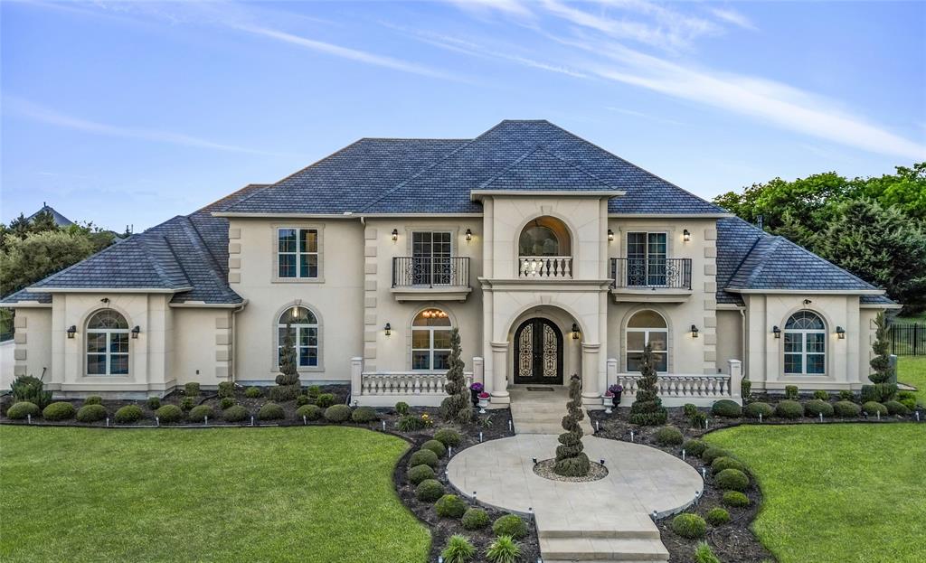 Great Location! Just minutes from premier shops, restaurants, US-75, and Hwy 121, this stunning custom home is nestled on a quiet cul-de-sac in the prestigious Hawks Wood subdivision. Situated on over an acre, this elegant residence was built in 2020 and features an open floor plan with soaring ceilings and an abundance of natural light.
With 5 bedrooms and 5.5 bathrooms, this home also includes a game room, two living areas, a formal dining room, a gourmet kitchen with a breakfast nook, an outdoor kitchen, a covered back patio, and a 4-car garage.
The chef’s kitchen seamlessly connects to the living area and breakfast nook, with easy access to the expansive backyard — perfect for entertaining. The luxurious main suite features a spacious dual-head shower, a bathtub, dual vanities, and a generous his-and-hers walk-in closet. A second suite is conveniently located on the main floor, ideal for guests.
Meticulous attention to detail throughout blends luxury and sophistication, making this extraordinary house your next home.