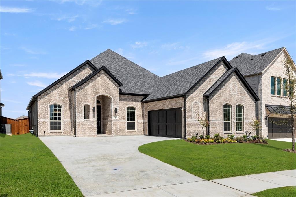 MLS# 20931594 - Built by Windsor Homes - Ready Now! ~ Discover this stunning new construction single-family residence in the desirable Nelson Lake Estates. This traditional home features 3 spacious primary bedrooms and 3 full and 1 powder bathrooms, providing ample space for comfort and convenience across 2,713 square feet. Enjoy an open floorplan with a gourmet kitchen showcasing quartz counters, a kitchen island, and a large walk-in pantry, seamlessly flowing into the inviting living area with a cozy gas fireplace. The home boasts high-end finishes, including media room and study. Outside, relax on the covered patio while appreciating the full sprinkler system on a landscaped interior lot. With a 2-car garage and situated within the Rockwall ISD, this residence is perfect for those seeking modern living in a serene community. This property is not just a house; its a place to call home.