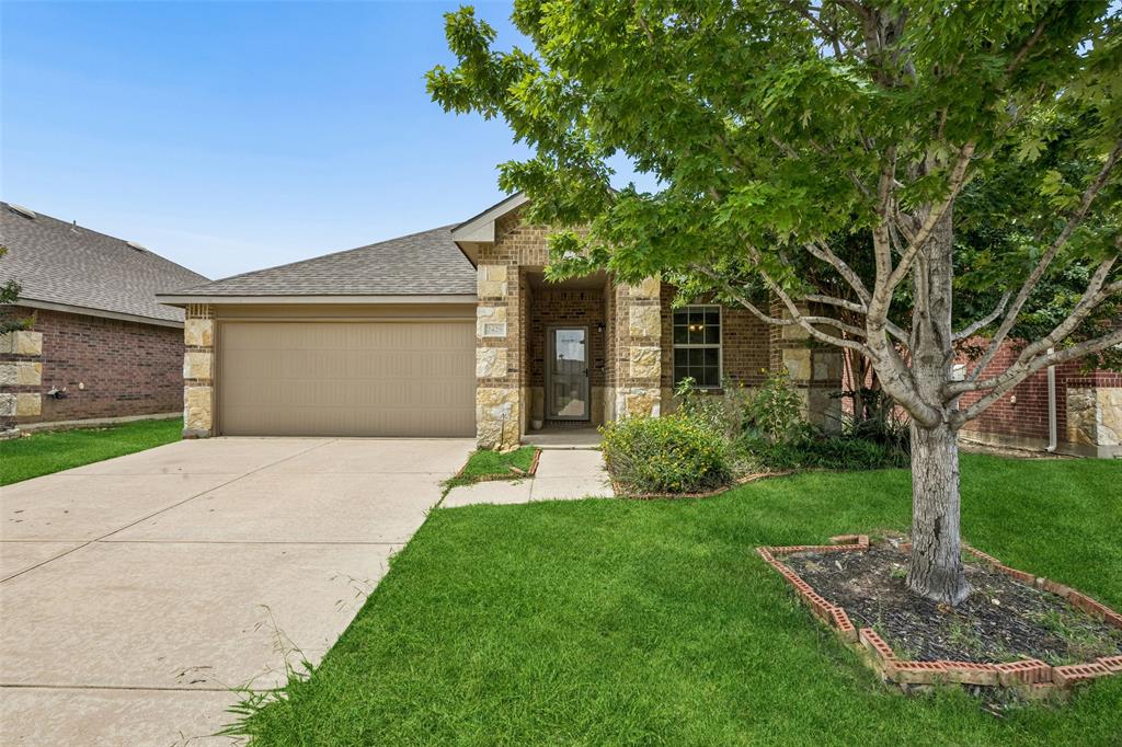 Well-maintained 4-bedroom, 2-bath single-family home with a 2-car garage located in North Fort Worth. This home offers an open-concept layout with seamless flow between the kitchen, dining, and living areas, designed for both everyday living and entertaining. The kitchen overlooks the main living space and features built-in cabinetry, a center island, and a walk-in pantry, providing excellent storage and functionality. The spacious primary suite includes dual sinks, a garden tub, and a walk-in closet. Secondary bedrooms are well-sized and flexible for use as guest rooms, office space, or additional needs. Luxury vinyl plank flooring extends throughout the entire home, offering a cohesive look, durability, and easy maintenance. Additional interior features include energy-efficient ceiling fans and double-pane windows that support comfort and efficiency while allowing abundant natural light. The backyard is enclosed with a combination brick and wood privacy fence, offering a defined outdoor space suitable for relaxation, play, or outdoor activities. Community amenities include a park, playground, and perimeter fencing. Conveniently located near Highway 114, I-35W, and the Alliance corridor, the property provides access to major employment centers, retail, dining, and entertainment destinations throughout North Fort Worth. Nearby attractions include Alliance Town Center, Presidio Towne Crossing, Tanger Outlets Fort Worth, and Texas Motor Speedway. Outdoor recreation opportunities can be found at nearby parks, trails, and green spaces throughout the North Fort Worth and Northlake areas. This location offers convenient access to daily necessities, recreation, entertainment, and employment hubs while maintaining a residential community setting. Buyers should independently verify all school zoning, HOA information, and community amenities. Schedule your home tour today!