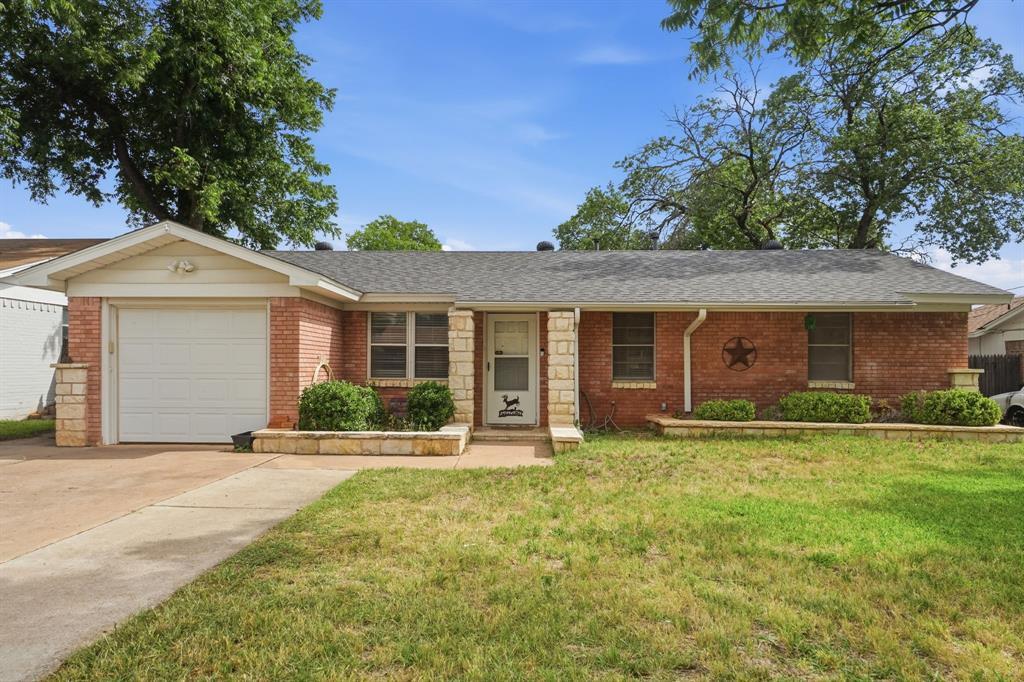 Welcome home to this charming and spacious 3-bedroom, 2-bath property nestled in an established South Abilene neighborhood. Situated beneath mature shade trees, this well-maintained brick home offers a warm and inviting layout with multiple living and entertaining spaces designed for comfortable everyday living.

Inside, you'll find a Open living area that flows seamlessly into the dining space and kitchen, creating the perfect setting for gatherings with family and friends. The kitchen features ample cabinet storage, generous counter space, making meal prep both functional and convenient.

The primary suite has a attached bathroom with a tiled walk-in shower, while 2 additional bedrooms provide flexibility for family, guests, hobbies, or a home office. A spacious bonus room adds even more versatility and can be used as a second living area, game room, media room, or workout space.

Step outside to enjoy the fenced backyard complete with a fire pit area, storage building, and an impressive workshop—ideal for woodworking, projects, hobbies, or extra storage. The large shade trees and outdoor space create a peaceful setting for relaxing or entertaining year-round.

Conveniently located near shopping, dining, schools, and all that South Abilene has to offer, this home combines comfort, functionality, and value in one great package.