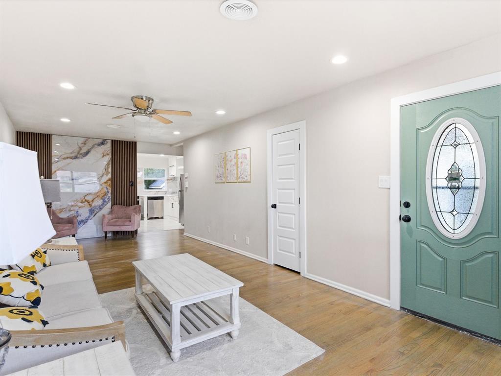 Welcome to this stunning 3-bedroom, 1-bath home offering 1,211 square feet of stylish living space. Step inside and immediately be greeted by rich refinished hardwood floors, dimmable recessed lighting, and a breathtaking floor-to-ceiling marble-inspired accent wall that creates a memorable first impression. As the home's stunning centerpiece, this focal point delivers a rare level of luxury for this price range.

Every update was thoughtfully selected to create a clean, bright, and upscale feel throughout the home. Whether you’re hosting family and friends or enjoying a quiet evening at home, the elegant finishes create a space you’ll be proud to own.

Conveniently located near AT&T Stadium and Globe Life Field, this home combines location, style, and comfort in one exceptional package.

Opportunities like this move quickly. Schedule your private showing today!