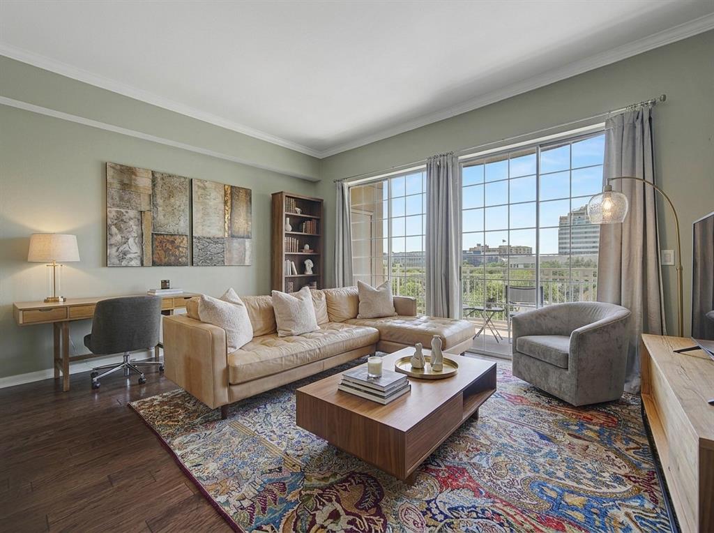 Experience elevated urban living in this beautifully updated 1-bedroom, 1-bathroom condo at The Renaissance at Turtle Creek. Nestled among the treetops with peaceful city views, this inviting residence offers the perfect combination of comfort, style, and convenience in one of Dallas’ most sought-after neighborhoods. Natural light pours through expansive windows, creating a bright and airy atmosphere throughout the open-concept living space. The spacious living and dining areas flow seamlessly together, making the home ideal for both everyday living and entertaining. Step onto the private balcony and enjoy tranquil views of the lush tree canopy and surrounding cityscape, the perfect place to unwind with morning coffee or an evening glass of wine. The updated kitchen features granite countertops, stainless steel appliances, ample cabinetry, and generous prep space, blending functionality with timeless design. Rich hardwood flooring adds warmth and sophistication throughout the main living areas, while fresh finishes create a move-in-ready opportunity for the next owner. The generously sized bedroom serves as a peaceful retreat with abundant natural light and excellent storage. Every detail of this home has been thoughtfully maintained, offering a low-maintenance lifestyle without sacrificing style. Residents of The Renaissance enjoy an exceptional collection of resort-style amenities, including two swimming pools, a fitness center with sauna, concierge, valet parking, secured garage access, and beautifully landscaped grounds. Ideally situated near Uptown, Oak Lawn, the Katy Trail, Turtle Creek Park, and Downtown Dallas, residents enjoy easy access to some of the city's best dining, shopping, entertainment, and outdoor recreation. Whether you're seeking a full-time residence, a lock-and-leave lifestyle, or an elegant urban retreat, this exceptional condo offers the perfect opportunity to experience luxury high-rise living in the heart of Dallas.