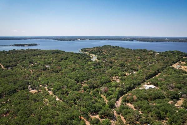 Nestled within the tranquil embrace of the Del Mar lake community, this sizable lot is priced to sell and ready for its new owner. Imagine crafting your dream home amidst the natural beauty of this enchanting environment that is just minutes away from the lake. With easy access to water-based activities such as boating and fishing, community ramp and park, this property invites you to embark on a lakeside lifestyle that promises both relaxation and adventure. Don't miss the chance to make this lakeside paradise your very own – reach out today to seize this exceptional opportunity and embrace the tranquility and beauty of lakefront living. OWNER FINANCING AVAILABLE. Buyer to verify any and all restrictions, measurements, POA, taxing and utility information.