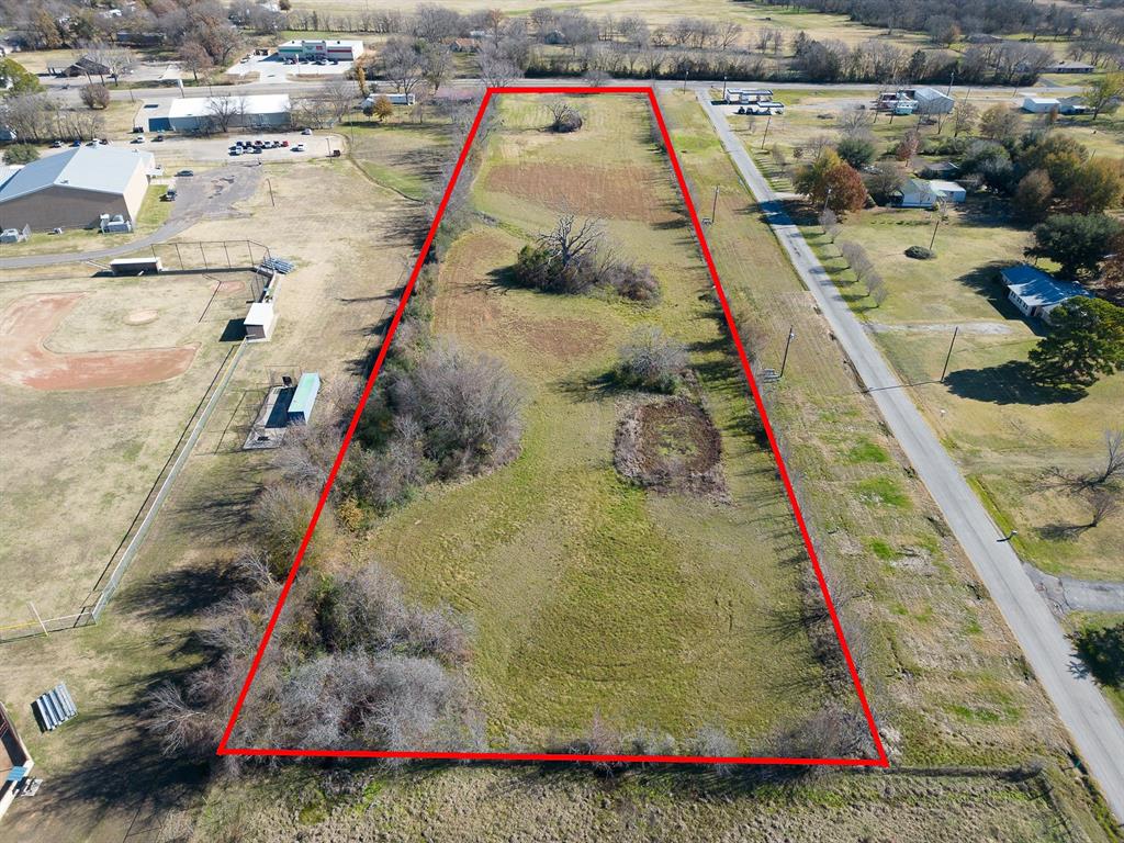 A prime 5 acre tract in Yantis, Tx. Conveniently located off HWY 154, close to your small town amenities and not far from your larger cities. Pastured land that is level and ready for your build, whether residential or commercial. Cow pond located at the back of the property. A few miles from Lake Fork. Red outline is approximate boundary. High speed fiber available with Peoples Telephone.