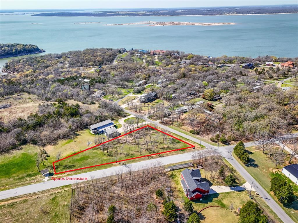 PRICE REDUCTION!!  DON'T MISS OUT !! Check out this beautiful corner lot near Lake Texoma! Perfect location to build your Dream Home. There is a water view to the West of the lake.  Lots of water fowl, and occasional deer and other wildlife viewing.  Just a short drive to the City of Pottsboro, Denison and Sherman, TX.  Hwy 289 corridor leads South to the Dallas area.  Take Hwy 289 North to Island View Recreational area, Lighthouse Resort and Marina and the Preston Point area.  Lake Texoma is a Corp of Engineers lake that has excellent fishing and boating fun for all ages.  Soon to come is a Margaritaville Bar and Restaurant!  Don't let this one slip away!