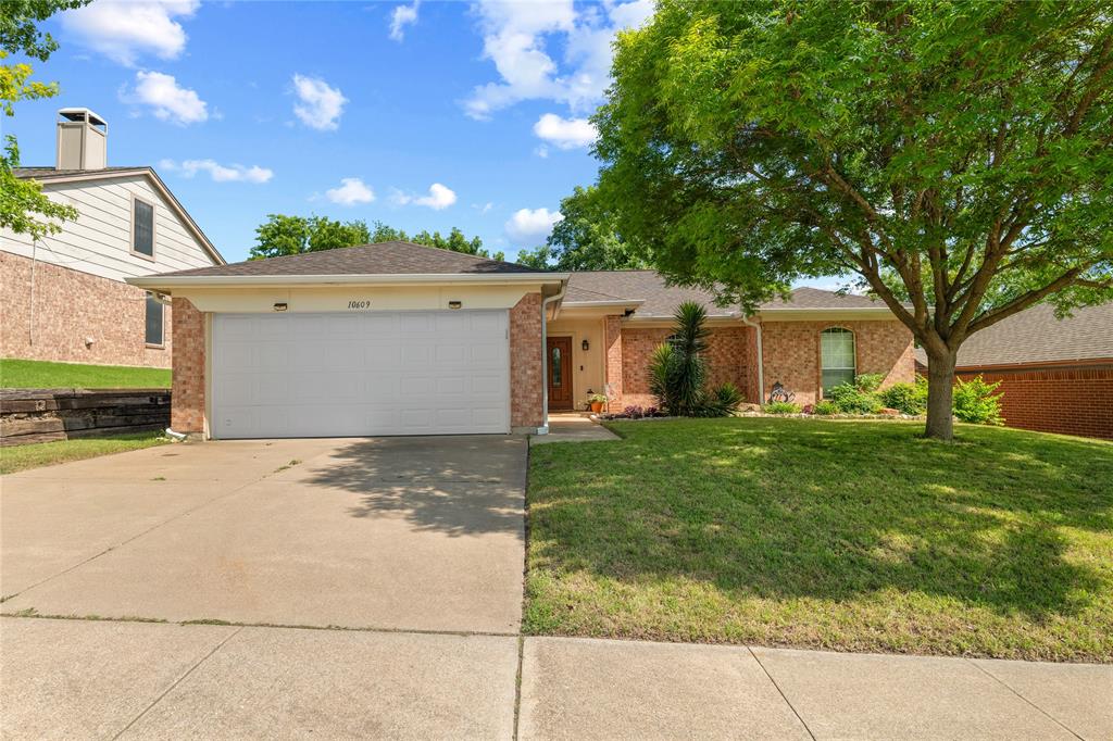 Tucked among some of Benbrook’s most desirable neighborhoods, Winchester offers homes with established character, mature trees, and approachable pricing near newer development. Inside, a wonderful open-concept layout pairs thoughtful updates with move-in ready condition. The living area features rich wood floors, tall ceilings, built-in speakers, and a wood-burning fireplace, with an easy flow into the spacious dining and kitchen areas. The kitchen offers ample cabinetry, granite countertops, stainless steel appliances, pantry, and a breakfast bar that keeps the space open and connected. The large primary suite includes dual sinks, upgraded granite countertops, a soaking tub, separate shower, and his-and-her closets. Both secondary bedrooms are generously sized, with one offering a wall-to-wall built-in desk. The guest bathroom also has upgraded granite countertops and a convenient tub-shower combo.  Out back, an extended porch provides a comfortable place to unwind in the private yard with wood fencing. With inviting curb appeal and convenient access to nearby parks, golf, and shopping, this home offers a compelling blend of charm, condition, and location. Video tour is available via text.
