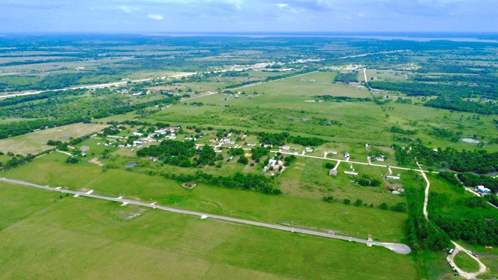 1-acre lots available in Navarro County, just outside of Corsicana and within Corsicana ISD. These lots are already cleared and offer a great opportunity for buyers looking to build or place a mobile home. Located just outside Corsicana, these homesites offer a peaceful rural setting with close proximity to city conveniences. Located just minutes from Downtown Corsicana and I-45, residents can enjoy an easy commute while still benefiting from space, privacy, and a country lifestyle. Nearby access to shopping, dining, schools, and essential services provides everyday convenience without sacrificing tranquility. Utilities are available, with water and electricity nearby. Minimal restrictions provide flexibility for various residential uses. Owner financing is available, making this an accessible option for buyers seeking an alternative to traditional bank financing.