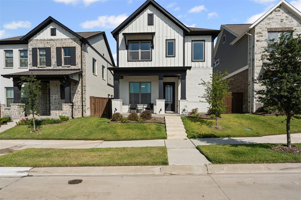 Welcome to this new construction, David Weekly home in the highly sought-after Walsh community of Fort Worth. Built just two years ago with thoughtful upgrades, this 2,366 sq. ft. residence offers 3 bedrooms, 2.5 bathrooms, a flexible floorplan and a calm, neutral color palette throughout.
This contemporary showpiece features a white brick-wood façade highlighted with dark trim, metal awnings and a welcoming front porch, all overlooking a peaceful greenspace.
Inside, the open spaces are filled with natural light and feature 12’ ceilings. A convenient office is ready for work-from-home days, while beautiful, upgraded flooring flows seamlessly into the main living spaces. The eat-in kitchen with breakfast nook is a showstopper. It includes upgraded hardware, a farmhouse sink, gas cooktop, a modern picket-tile backsplash, pantry, and a large island perfect for gathering and hosting.
The living room is anchored by a gas fireplace with a stylish cement tile surround. Nearby, a mudroom leads to the two-car garage equipped with extra storage space and a 240-volt wall outlet making it electric vehicle ready. A stylish powder bath completes the first floor.
The Berber-carpeted stairway leads to a cozy landing with window seating, a laundry room, and three well-sized bedrooms. The primary suite features abundant windows, a spa-style bath with double vanities, private water closet, and a spacious walk-in closet. Two additional bedrooms share a full bath detailed with subway tile, while a storage closet and floored attic provide space for out-of-season extras.
Outside, a patio and fenced yard offer privacy for entertaining and more.
The Walsh community is located just 12 minutes from downtown Ft. Worth on the historic Walsh Ranch. When complete, the community will feature 2,300 acres of open space with native prairie land and 32+ miles of hike and bike trails. Families have access to the award-winning Aledo ISD schools.