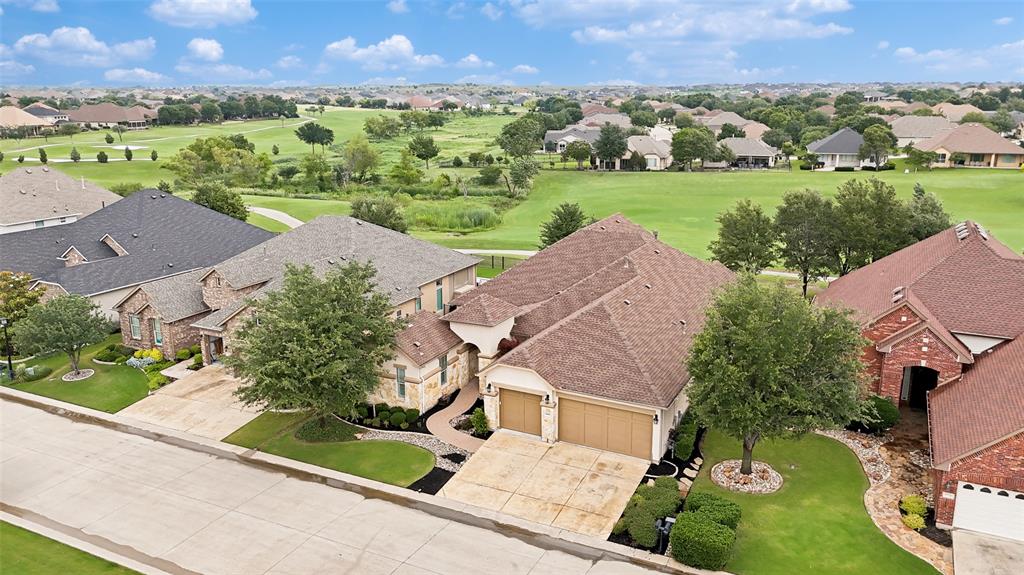 Perfectly positioned along the 9th hole of the West Course, this exceptional golf course home offers sweeping fairway views stretching toward the green and clubhouse—delivering the kind of backdrop that makes every morning coffee and evening cocktail feel like a getaway.

Designed for both comfortable everyday living and effortless entertaining, this beautifully appointed Navarro floor plan offers 3-bedroom, 3.5-bath, including a private casita, dedicated office-flex space, and an oversized 3-car garage. The open-concept design centers around a gourmet kitchen featuring granite countertops, a robust island, 5-burner gas cooktop, double ovens, ice maker, built-in refrigerator, and seamless flow into the spacious great room complete with a show-stopping wet bar—all perfectly oriented to capture the stunning outdoor views.

The owner’s retreat is a true sanctuary, offering loads of natural light, a spa-inspired bath with dual vanities, oversized walk-in shower, and a custom closet. Guests will feel thoroughly pampered with both a private detached casita with full bath and walk-in closet, as well as a spacious secondary en-suite bedroom.

With luxury finishes, thoughtful functionality (including abundant attic storage and an electric lift), and one of the most desirable locations in the neighborhood, 11800 Clemson isn’t simply a home—it’s the lifestyle you’ve been waiting for. In Robson Ranch, the amenities are second to none—championship golf, resort-style pools, state-of-the-art fitness, pickleball, tennis, clubs, dining, concerts, and endless opportunities to connect and play—all within this vibrant golf cart-friendly active adult community.