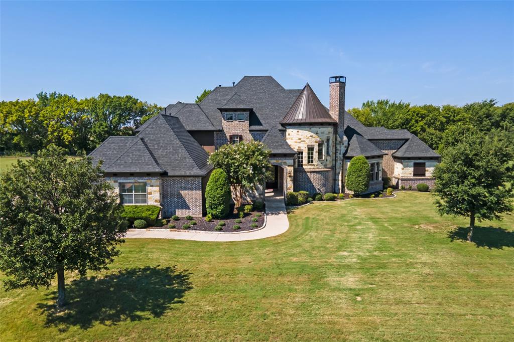 This gorgeous, palatial residence blends the beauty of French & traditional styles while feeling at home on the ranch. The home is sure to captivate with neutral hues & alluring curb appeal. 
Step inside & find hand scraped floors, soaring ceilings & light filled rooms. In this idyllic environment, life is meant to be enjoyed. The eat-in kitchen is outfitted with your favorite resident chef in mind with an additional family room & formal dining. 
The owner’s retreat is a sanctuary. This fabulous space is perfect for relaxation & recharge. Enter the ensuite & savor the exquisite jetted, soaking tub, dual sinks & lots of storage. Meanwhile, the walk-in closet is sure to impress as well. 
This home was built to entertain. With a game & media room that includes a bar, kitchenette, space for multiple viewing areas, billiards, cards & more.
Seller is willing to provide 10k in seller paid closing costs to help with buy down rate with reasonable offer.