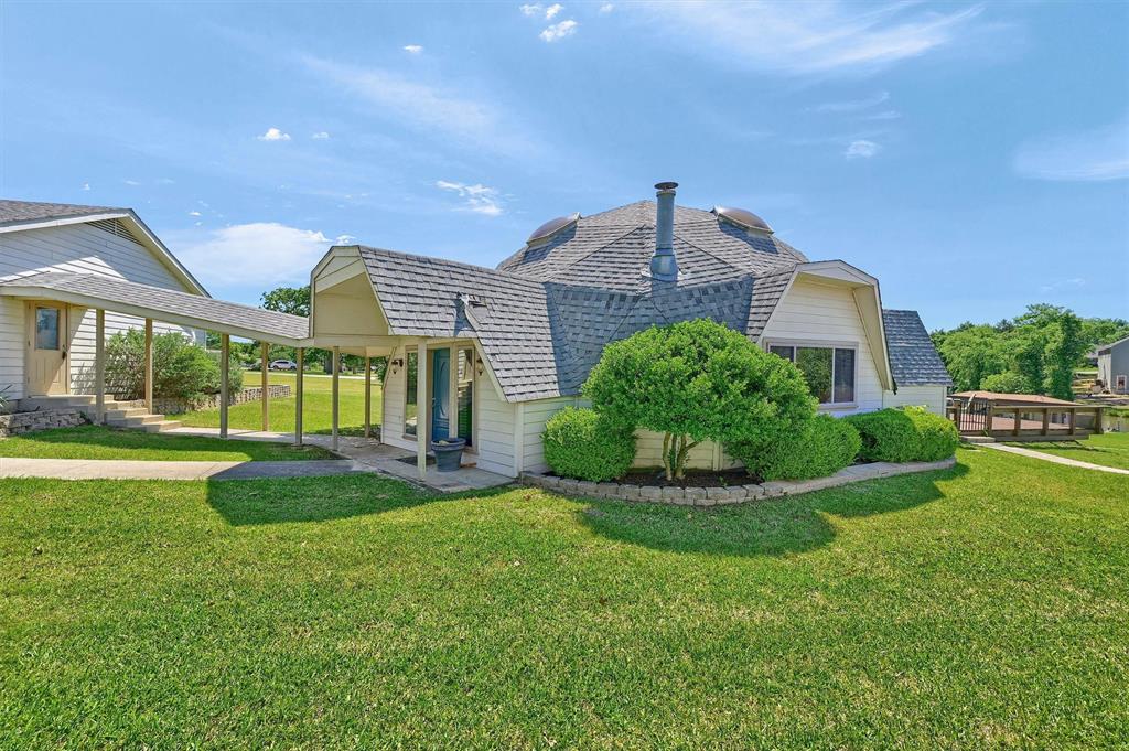 Unique lakefront home with nice updates, two bedrooms and  2 bathrooms. Oversized garage with space for golf cart.   Custom boat dock with boat lift, double jet ski lift, outdoor kitchen, fireplace and small climate controlled room.  Enjoy the professional 18 hole golf course included in your monthly POA dues.  Lake Kiowa offers two beach areas, a lodge with restaurant, large pavilion, kids playgrounds, tennis and much more.
All information and measurements to be verified by buyer
