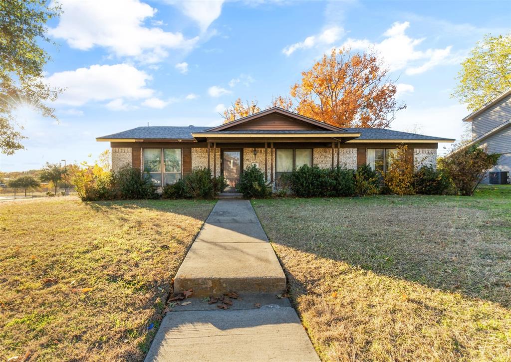 Located on a generous corner lot, this one-story home with a new roof and covered front porch has enormous potential. The entry opens to the dining and spacious living room which both lead to the kitchen and breakfast room. There are three bedrooms, two baths, a two-car garage and a large fenced-in back yard. Excellent opportunity for a project, bring your contractor. House is in an estate and being sold as-is.
