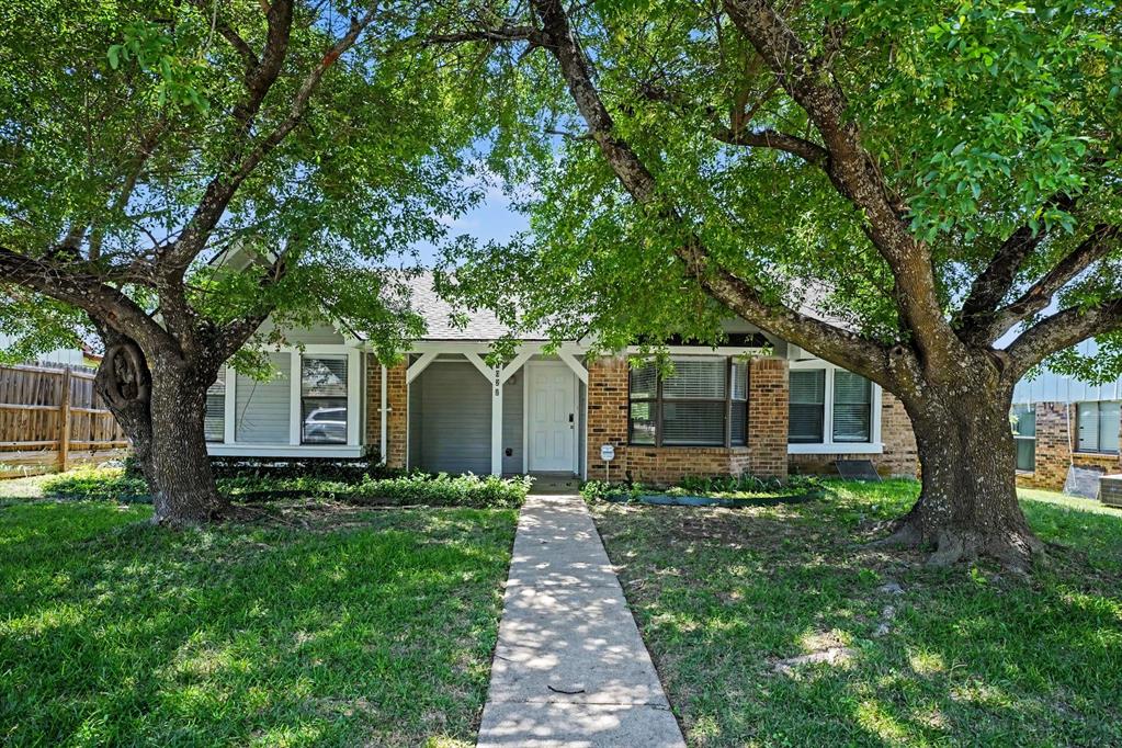 This exceptional 3-bedroom, 2-bathroom single-story home is in pristine, move-in ready condition, perfectly combining effortless stairs-free living with premium modern updates. The heart of the home features a beautifully updated kitchen fully outfitted with elegant granite countertops, creating a sophisticated and highly durable hub for cooking and entertaining that flows seamlessly into the main living areas. Designed with a thoughtful, open layout, the interior leads out beautifully to a spacious backyard, providing a wonderful private canvas for gardening, pets, play, or relaxing weekend barbecues. Complete with an attached 2-car garage providing secure parking and excellent extra utility storage, this turnkey residence is meticulously prepared for a completely stress-free transition into a stylish, relaxed lifestyle.