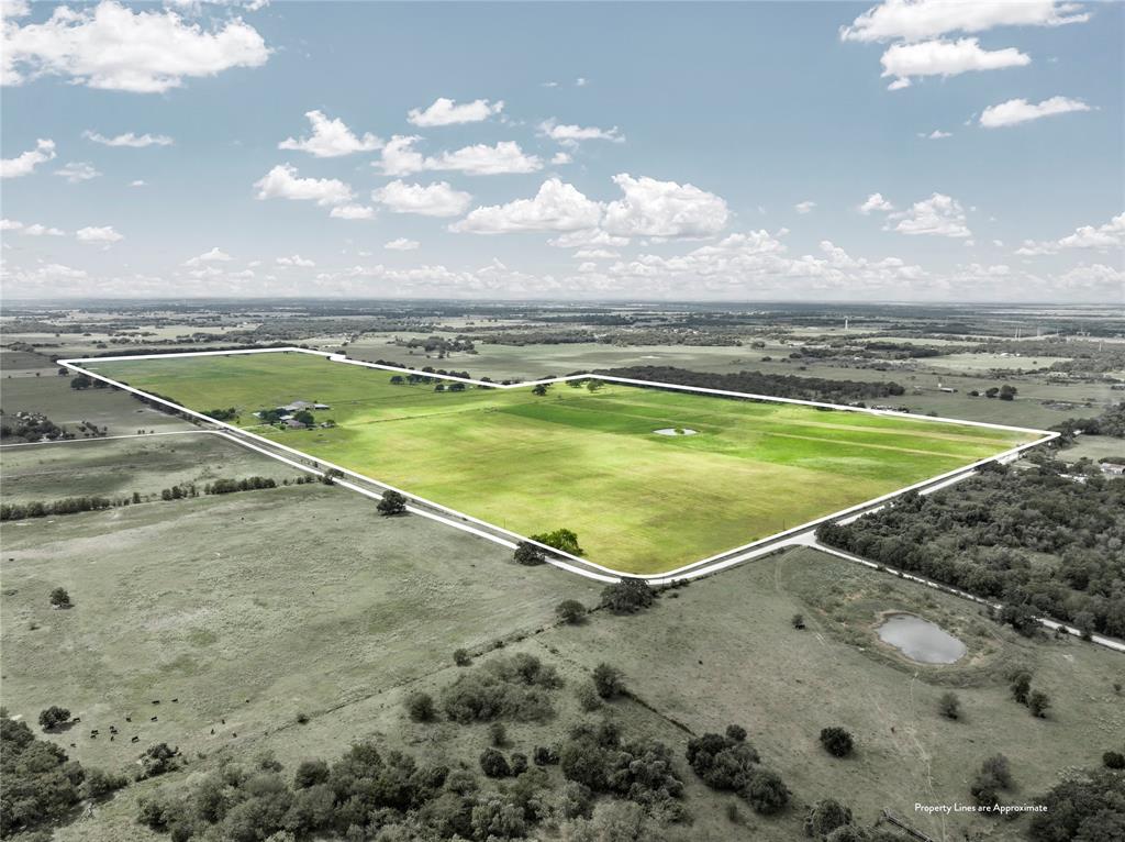 ALMOST 190 ACRES OF BEAUTIFUL HILL COUNTY LAND FOR SALE!!! The saying, “Buy land, they’re not making any more,” has never been more true. As many local ranchers are saying, this may be the last generation able to buy large chunks of Texas land, as big parcels are being sold, divided, and developed for housing, retail, and more. This expansive 190 acres in Central Texas, located in the quaint town of Aquilla in Hill County, offers peace, privacy, and the freedom to do whatever you desire on your own slice of Texas Heaven. Ideal for ranchers and farmers, the land is perfect for raising livestock and baling hay with its fertile soil. For recreational use, the property provides ample space for hunting, with quail, dove, deer, and jackrabbits roaming freely. It also features 3 water wells, access to multiple water meters, pipe fencing, a large water tank, and diverse topography across 7 pastures. This property comes with two homes and large barn. Don’t miss the opportunity to make this special land your own and create memories for generations to come! Opportunities for land like this do not come often!