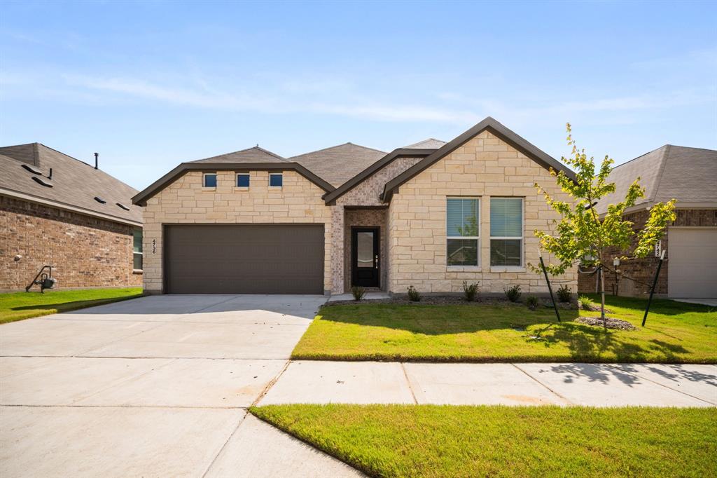 Skip the wait and step into a truly brand new home; never lived in, beautifully finished, and ready for immediate move in. Plans changed for the sellers, giving buyers a rare opportunity to enjoy a better than new construction experience without the build times, delays, or uncertainty. This spacious 4 bedroom, 2 bath home features an inviting open concept layout designed for modern living. The large family room flows effortlessly into the kitchen, where you’ll find a generous eat-at island, sleek finishes, and a bright dining area perfect for everyday meals or entertaining. The split bedroom design offers privacy for everyone, with a large primary retreat tucked away from the secondary bedrooms. Throughout the main living areas, durable and stylish LVP flooring adds warmth, continuity, and easy maintenance. Located in a vibrant community, residents enjoy access to a fantastic community pool and splash pad; ideal for summer fun and family time. Don't miss this rare opportunity to own new priced below the builder!