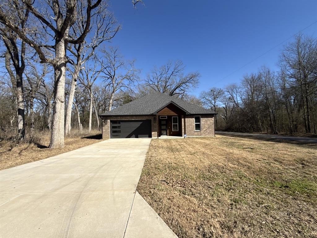 Great property in the gated Beechwood Subdivision of Cedar Creek Lake. This charming 3 bed, 2 bath home is the perfect space for families or anyone looking for a comfortable living space. The kitchen is equipped with appliances and plenty of counter space and beautiful kitchen island to cook your favorite meals. The bedrooms are spacious and offer plenty of closet space. The backyard is the perfect space for outdoor activities or just relaxing in the sun. This home is located in a quiet gated neighborhood, with Lake access and HOA amenities including a playground, swimming pool, clubhouse, tennis court, Pickleball court, and boat ramp. Don't miss out on the opportunity to make this your new home! Sold AS-IS.