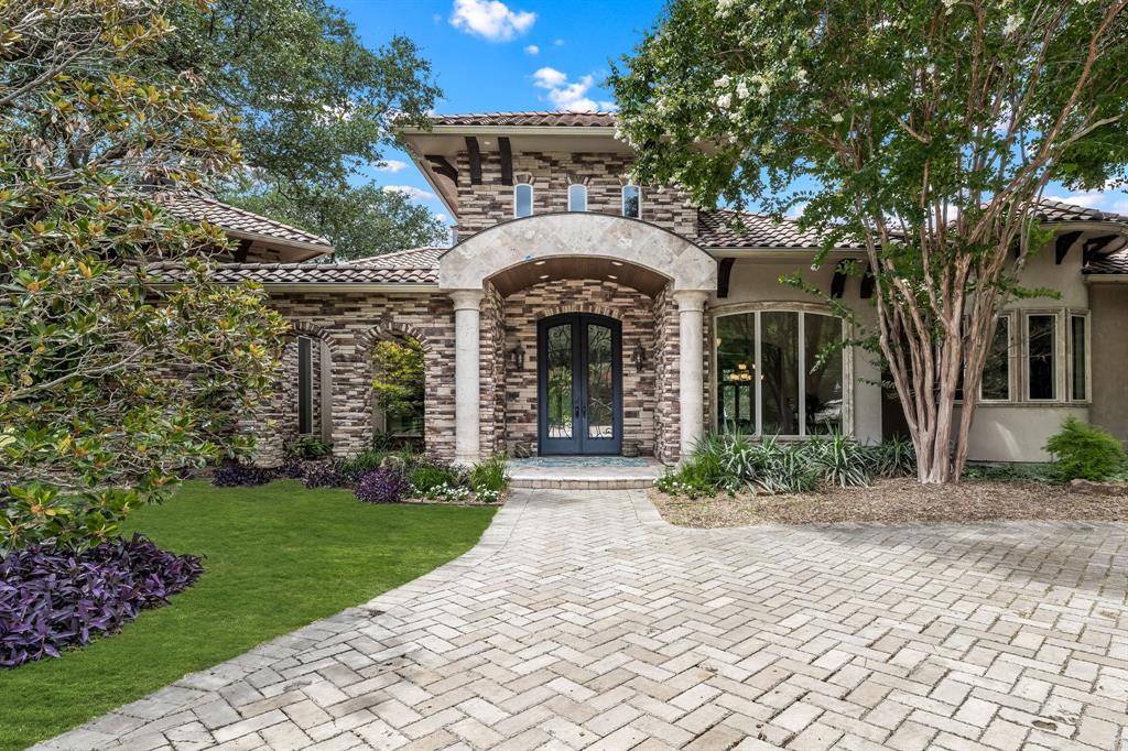 Luxurious Plano Estate with breathtaking lake views. This stunning home is nestled on sprawling 2.21 acres in sought-after Ranchero Estates. Backyard paradise featuring a sparkling pool and spa, outdoor kitchen, and incredible lake views. This exceptional home offers a multitude of amenities, including a grand foyer leading to a formal dining room and butler's pantry with wine bar. The family room also features captivating lake views. The media room and game room are both located on the lower level. The gourmet kitchen is a chef's dream featuring upscale stainless-steel appliances and tons of storage space. The luxurious primary suite is designed to make the most of the stunning lake view. The spa-like primary bathroom boasts a jetted tub, large mirrored vanities, and a remarkable stone shower with dual rain heads. This unique property, with a 4 car garage, circle driveway, breathtaking lake views, and countless luxurious features, is an opportunity not to be missed!